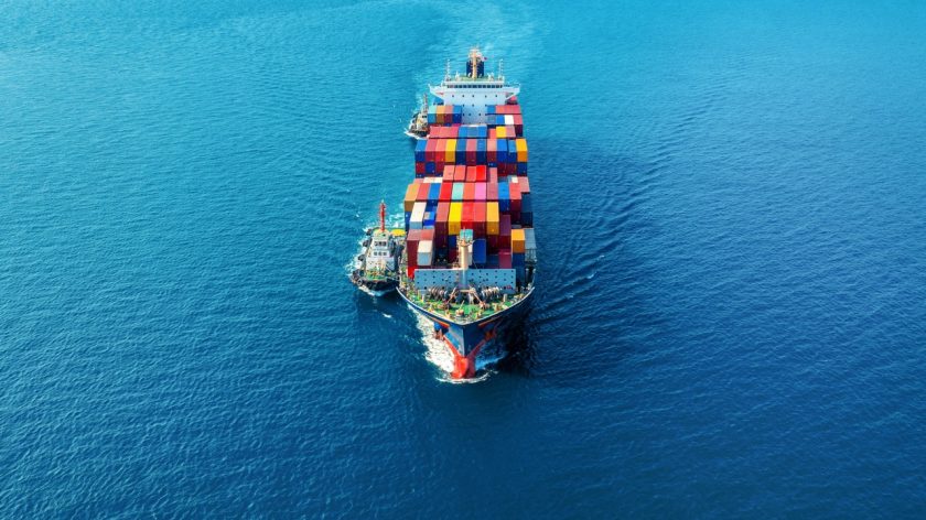 Aerial view of cargo ship with cargo container on sea. Aerial view of cargo ship with cargo container on sea.